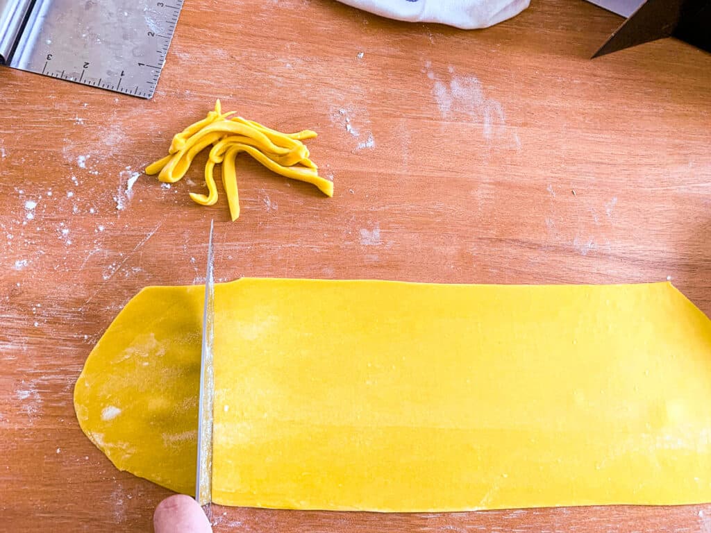 Squaring off sheets of pasta dough
